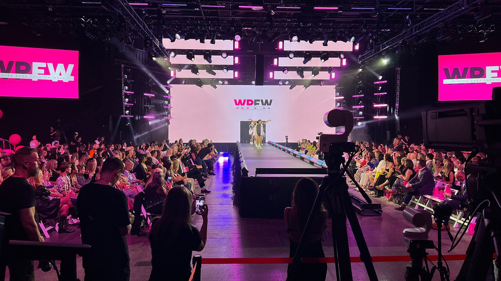Audience gathers at the Full Sail Live venue to attend the Winter Park Fashion Show.