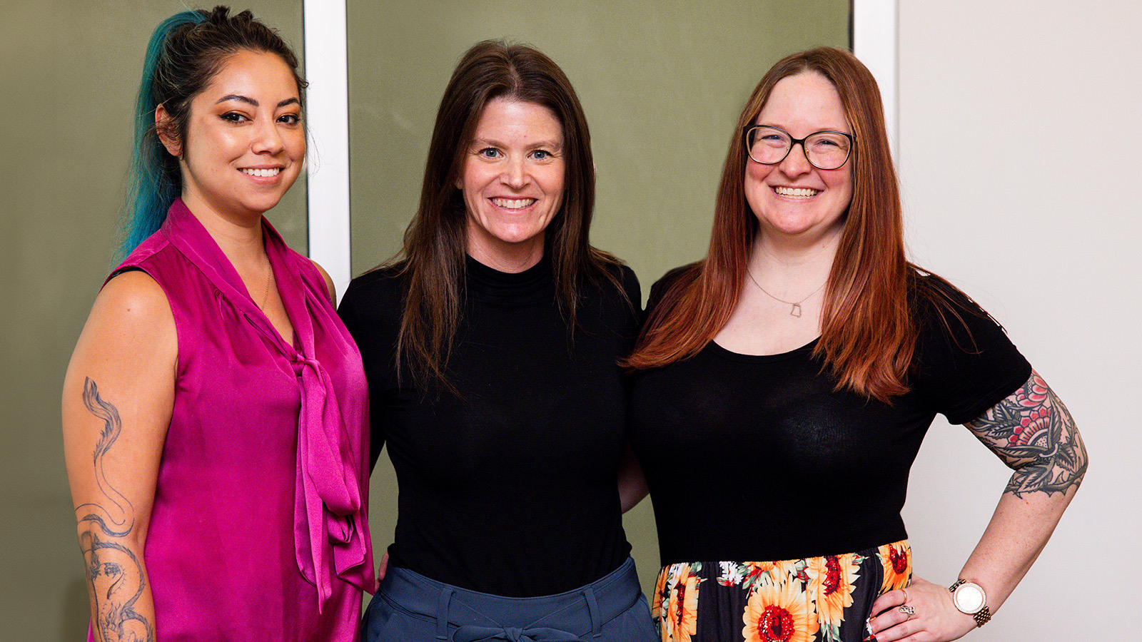 Three women from Full Sail nominated at this year’s *gamehers Awards are seen standing together and smiling at the camera.