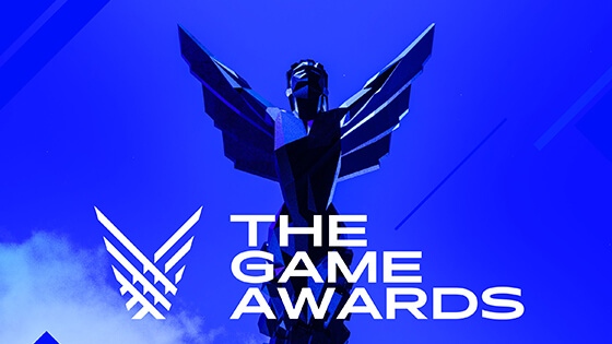 A graphic with a blue background and a Game Awards trophy sitting on a pedestal. The words “The Game Awards December 9” are overlaid in white.