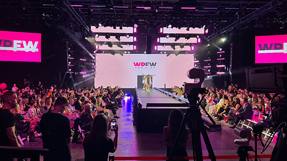 Audience gathers at the Full Sail Live venue to attend the Winter Park Fashion Show.