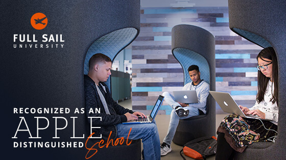 Three students using MacBooks sit on gray and blue chairs. The Full Sail logo is in the image’s top-left corner with the words “Recognized as an Apple Distinguished School” beneath it