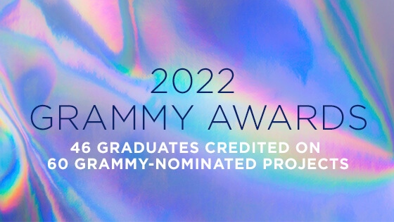 A graphic with a multicolored holographic background and the words 2022 Grammy Awards in blue with the words 47 Grads Credited on 60 Grammy-Nominated Projects beneath it in white.