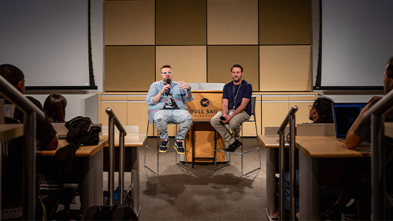 Aaron B. Koontz and Larry Katz lead a Q&A in Full Sail's EB Auditorium, speaking to students about film and television production.