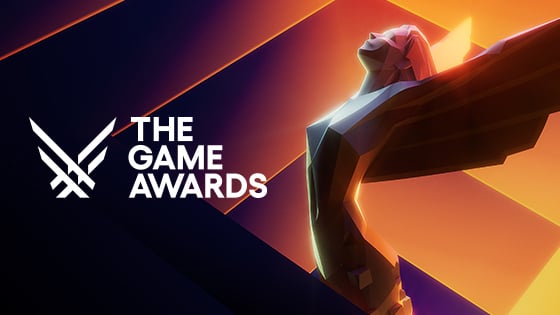 An illustration of The Game Awards statuette which features a woman with outstretched wings against an orange and yellow gradient backdrop, the words 'The Game Awards' appear in white text on the left of the image.