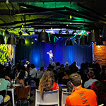 Musical artist “Asa” performs at the Treehouse in front of a large crowd at the 3300+ Climbing 10th anniversary.