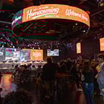 The Full Sail University Fortress is filled with a large crowd of spectators while varsity compete against alumni during Hall of Game: Homecoming.