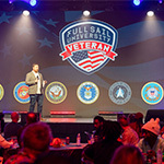 Director of Military Student Success Aaron Hall hosts Thanksgiving dinner in the Full Sail Live venue.