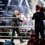 Fans fill Full Sail Live as Triple H addresses the crowd during WWE’s ‘NXT Homecoming’ event.