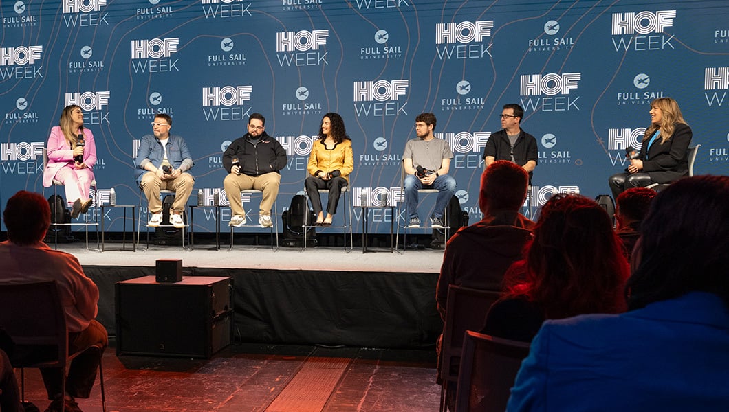 Katrina Mena Rick, Aaron B. Koontz, Alejandro García-Tuñón, Martina Bozic, Jason Citron, and Jonathan Mayer sit on a panel with a moderator in front of an audience.