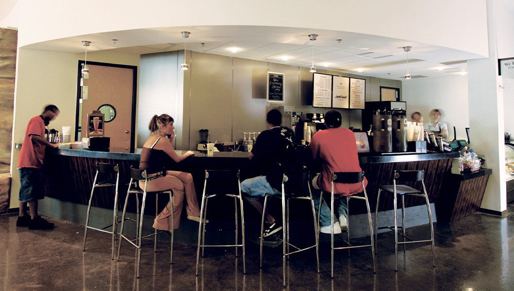 Students relax and sip drinks at the JetFuel cafe in Building 3.