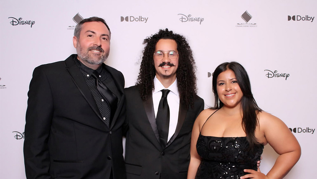 Guillermo Moya poses with his mentor Jason Strawley and girlfriend Kiara Coll.