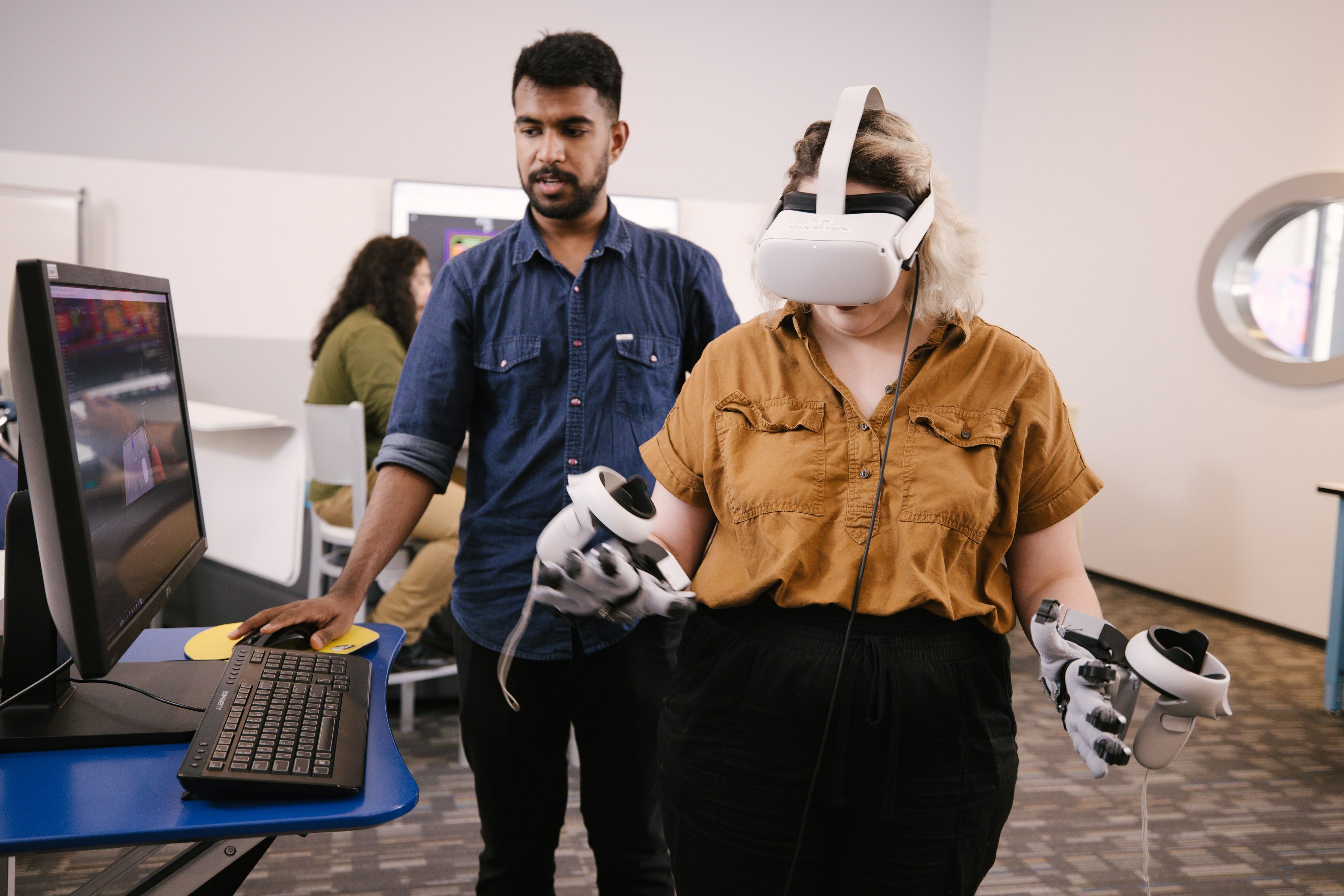 Emerging Technologies students work together within the Full Sail University Healthcare Technology Lab powered by Full Sail University